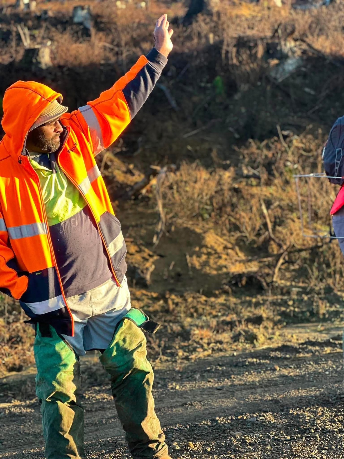 An FM Silvi crew member directing work on a block
